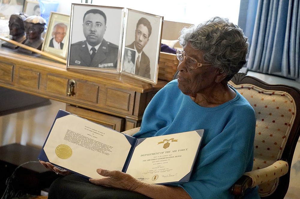 CORRECTS NAME OF BATTALION - World War II veteran Maj. Fannie Griffin McClendon pauses while speaking about her past at her home, Thursday, June 10, 2021, in Tempe, Ariz. McClendon had a storied history as a member of the 6888th Central Postal Directory Battalion that made history as being the only all-female, black unit to serve in Europe during World War II. (AP Photo/Matt York)