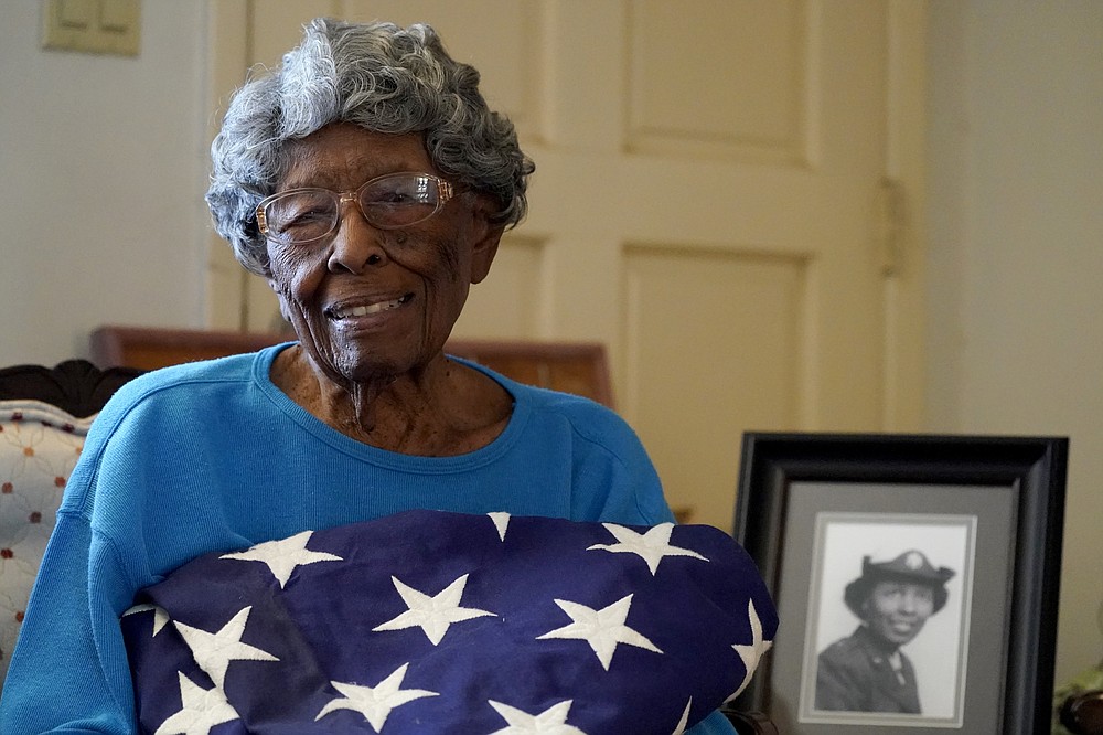 CORRECTS NAME OF BATTALION - World War II veteran Maj. Fannie Griffin McClendon poses at her home, Thursday, June 10, 2021, in Tempe, Ariz. McClendon had a storied history as a member of the 6888th Central Postal Directory Battalion that made history as being the only all-female, black unit to serve in Europe during World War II. (AP Photo/Matt York)