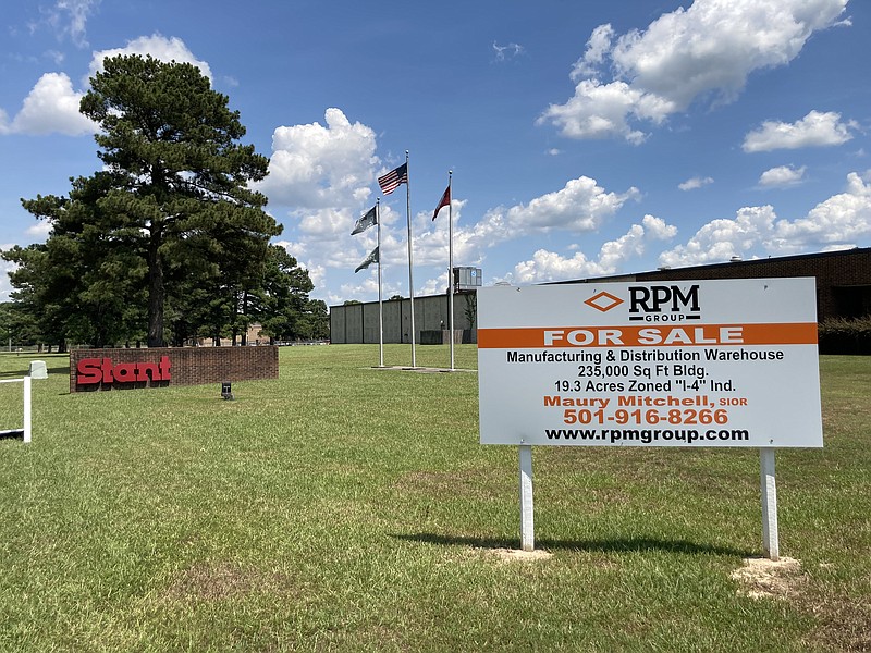 A "for sale" sign sits in front of the Stant Manufacturing plant located in the Jefferson Industrial Park. Company officials have been tight-lipped, but an auction of most of the company's equipment has been set for later this month. (Pine Bluff Commercial/Byron Tate)