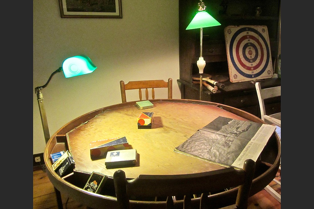 Ernest Hemingway enjoyed poker as well as darts in his in-laws’ barn loft. (Special to the Democrat-Gazette/Marcia Schnedler)