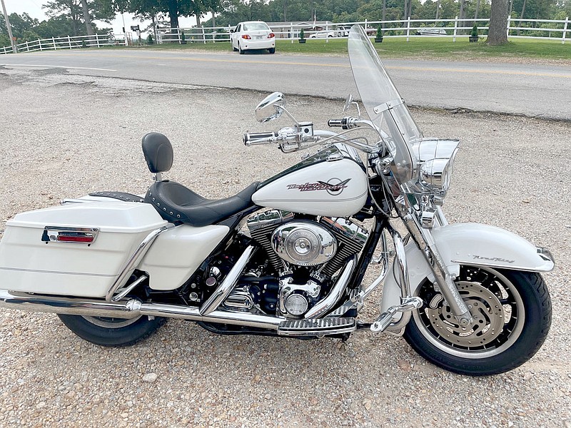 COURTESY PHOTO This 2005 Harley-Davidson Road King will be given away during a donation ticket raffle at the Pipes for Pups Poker Run benefiting the Saber Life Foundation on Aug. 7.