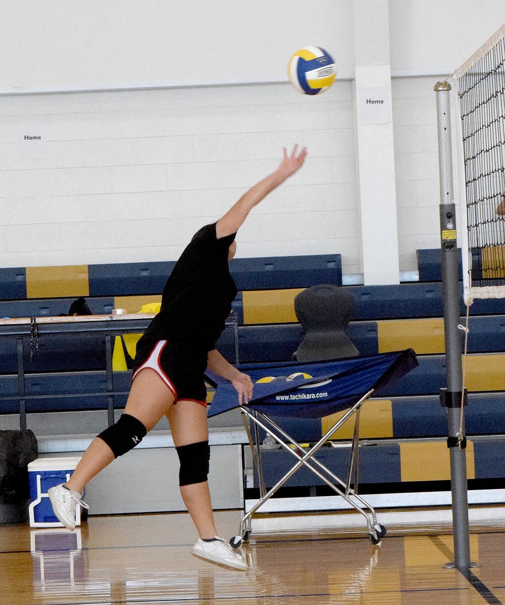 Westside Eagle Observer/MIKE ECKELS
Lindy Lee hits the ball over the net during a volleyball training exercise in the gym at Decatur Middle School Thursday morning, The Lady Bulldog junior high team is getting ready for its 2021 volleyball season which starts in late August.