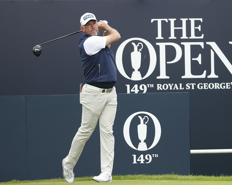 England's Lee Westwood plays his tee shot from the first tee during Wednesday's practice round for the British Open Golf Championship at Royal St George's golf course in Sandwich, England. The Open starts Thursday. - Photo by Peter Morrison of The Associated Press