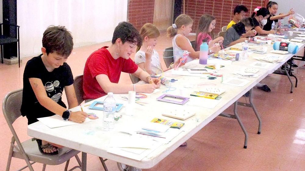 Marc Hayot/Herald-Leader Kids ages 10-14 participated in the senior art camp held by the Parks and Recreation Division from 10 a.m. to 12 p.m. July 12-15 at the Parks and Recreation office. The camp is one of four mini summer camps held by Parks and Recreation this summer. The other three camps were archery camp held from the 12-14; junior art camp held July 6-9 and S.T.E.M. (Science, Technology, Engineering and Mathematics) camp held June 14-18. The S.T.E.M. and junior art camps were held at the parks and recreation office while the archery camp was held at the Siloam Springs Kayak Park.