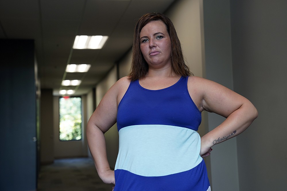 Megan Sims is seen at Horizons in Carrboro, N.C., Tuesday, July 13, 2021. Sims couldn't stop using drugs during the pandemic, even as she discovered she was pregnant. Through word of mouth, Sims discovered Horizons, a substance use disorder treatment program at the University of North Carolina's School of Medicine that is designed specifically for pregnant women and mothers. "Horizons saved my life." Sims said. (AP Photo/Gerry Broome)