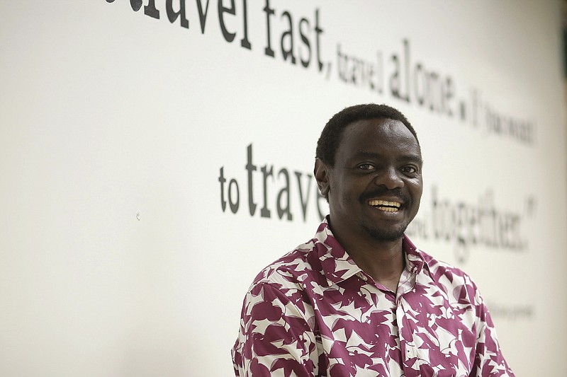 Benito Lubazibwa, founder of Advancing Black Entrepreneurship Wednesday July 14, 2021 in part of the space for the new The Rock It! Lab, a partnership between the Central Arkansas Library System and Advancing Black Entrepreneurship in Little Rock  (Arkansas Democrat-Gazette/Staton Breidenthal)