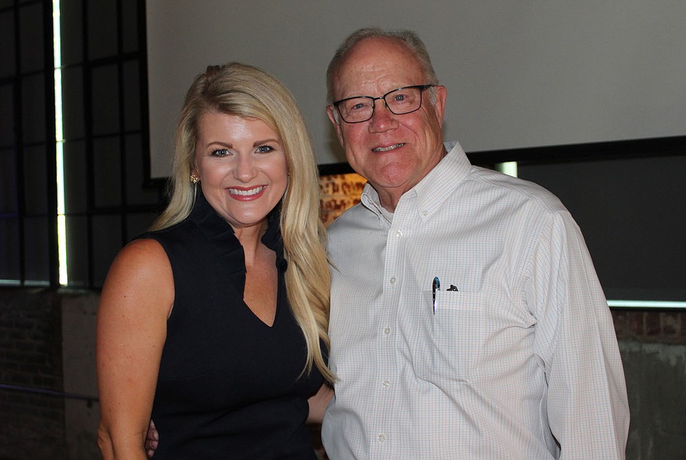 Natalie Bartholomew and Jim Crouch visit at the SPSFNWA celebration.
(NWA Democrat-Gazette/Carin Schoppmeyer)