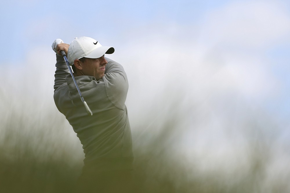 Northern Ireland's Rory McIlroy plays his tee shot on the 3rd hole during the second round of the British Open Golf Championship at Royal St George's golf course Sandwich, England, Friday, July 16, 2021. (AP Photo/Ian Walton)