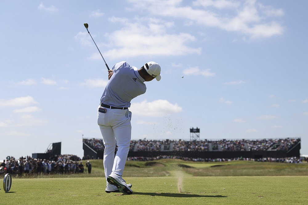 United States' Collin Morikawa hits his tee shot on the 16th hole during the second round of the British Open Golf Championship at Royal St George's golf course Sandwich, England, Friday, July 16, 2021. (AP Photo/Peter Morrison)