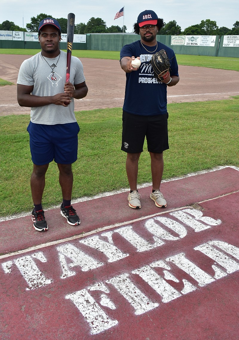 R.J. Stinson, left, and Randy Little Jr. of the Arkansas Baseball Collegiate League won top awards during the summer baseball program's All-Star break earlier this month. (Pine Bluff Commercial/I.C. Murrell)