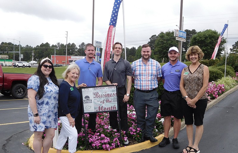 From left are Kristen Mangham of Garvan Woodland Gardens, Master Gardener Cindy Hart, Tillery grandsons Charles, Chandler, Colton, and Carson, and Juneann Green, Master Gardener. Not pictured is Master Gardener Carolyn Davis. - Submitted photo