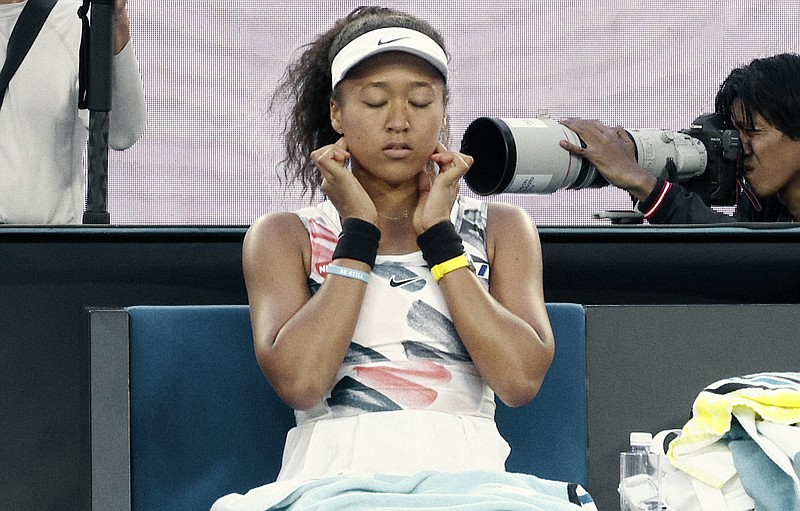 Naomi Osaka seems to only want peace in a scene from the docuseries Naomi Osaka, which premiered on Netflix July 16. (Netflix via AP)