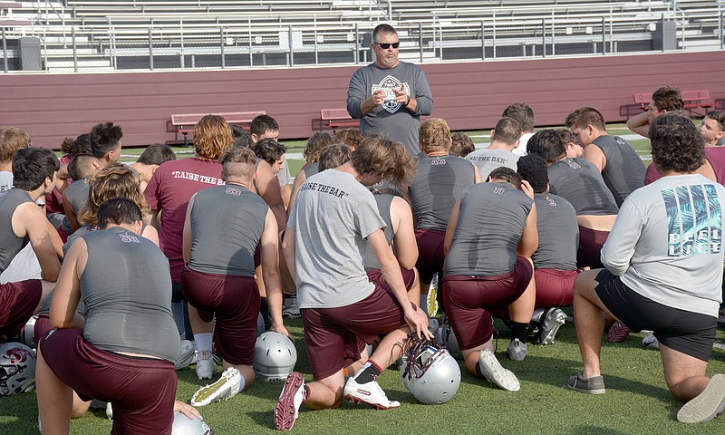 Graham Thomas/Siloam Sunday
Siloam Springs football coach Brandon Craig speaks to the Panthers following Thursday's workout session. The Panthers have two weeks left of summer workouts before fall practice begins Aug. 3.