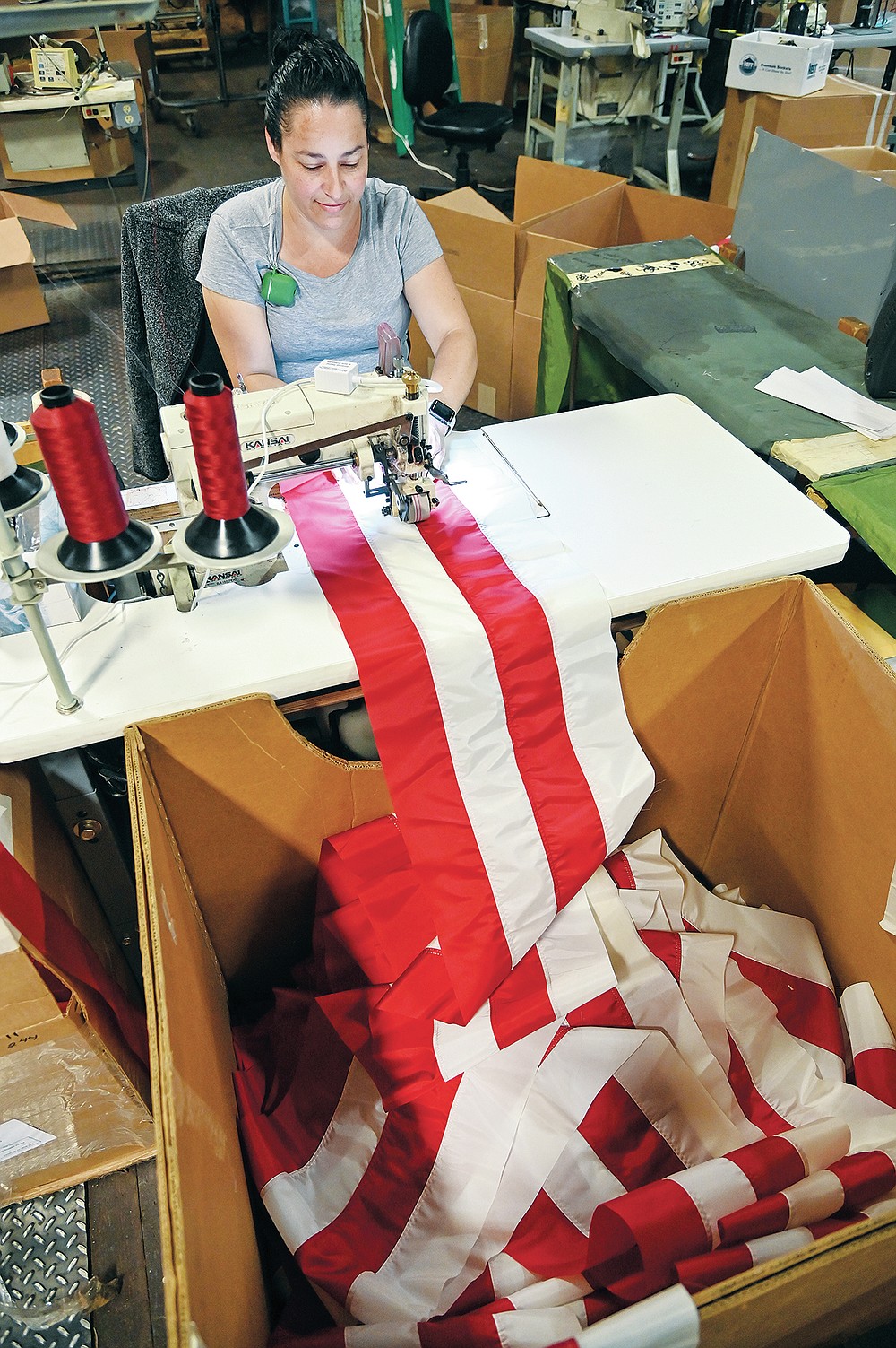 Sewing stars and stripes American flags manufactured in Pennsylvania
