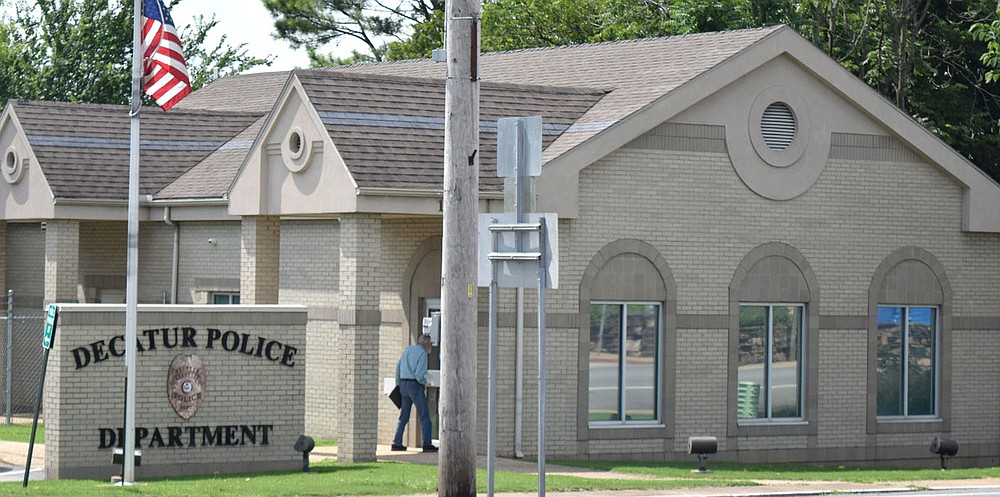 Westside Eagle Observer/MIKE ECKELS
The Decatur Police Department currently occupies the house where the Decatur Telephone Company once owned. A winery occupied the basement of the old house that stood in this very spot for several decades before it was torn down to make way for the present structure.