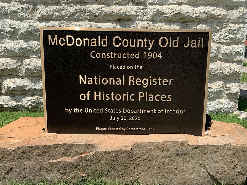 ALEXUS UNDERWOOD/SPECIAL TO MCDONALD COUNTY PRESS. Representative Bill Lant and Mayor Gregg Sweeten unveiled the plaque at the celebration. Cornerstone Bank donated money for the plaque that sits outside of the McDonald County Old Jail.