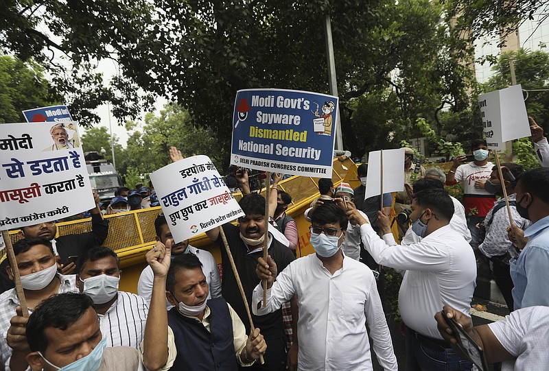 Congress party workers shout slogans during a protest accusing Prime Minister Narendra Modi’s government of using military-grade spyware to monitor political opponents, journalists and activists in New Delhi, India, Tuesday, July 20, 2021. The protests came after an investigation by a global media consortium was published on Sunday. Based on leaked targeting data, the findings provided evidence that the spyware from Israel-based NSO Group, the world’s most infamous hacker-for-hire company, was used to allegedly infiltrate devices belonging to a range of targets, including journalists, activists and political opponents in 50 countries. (AP Photo/Manish Swarup)