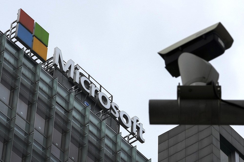 A security surveillance camera is seen near the Microsoft office building in Beijing, Tuesday, July 20, 2021. The Biden administration and Western allies formally blamed China on Monday for a massive hack of Microsoft Exchange email server software and asserted that criminal hackers associated with the Chinese government have carried out ransomware and other illicit cyber operations. (AP Photo/Andy Wong)