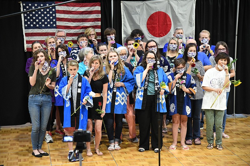 The Hot Springs Sister City Program performs group karaoke at the Hot Springs Convention Center on July 15. - Video by Tanner Newton of The Sentinel-Record