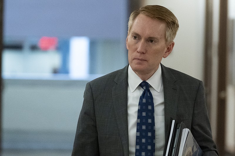 Sen. James Lankford, R-Okla., arrives for a hearing on Capitol Hill, June 8, in Washington. Lankford,  whose voting record in the Senate has aligned with former President Donald Trump’s position nearly 90% of the time, finds himself under fierce attack by a challenger in his own party. Similar scenes are playing out in other red states where ultra right-wing challengers are tapping into anger among Republicans over Trump's election loss and coronavirus-related lockdowns. - AP Photo/Alex Brandon