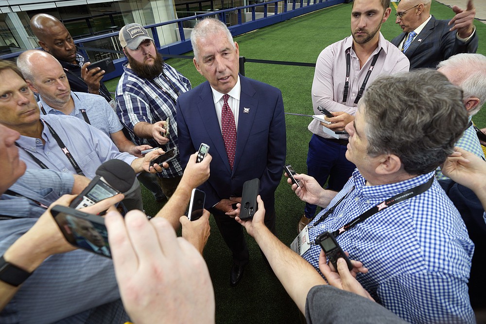 Big 12 commissioner Bob Bowlsby speaks to reporters during NCAA college football Big 12 media days Wednesday, July 14, 2021, in Arlington, Texas. (AP Photo/LM Otero)