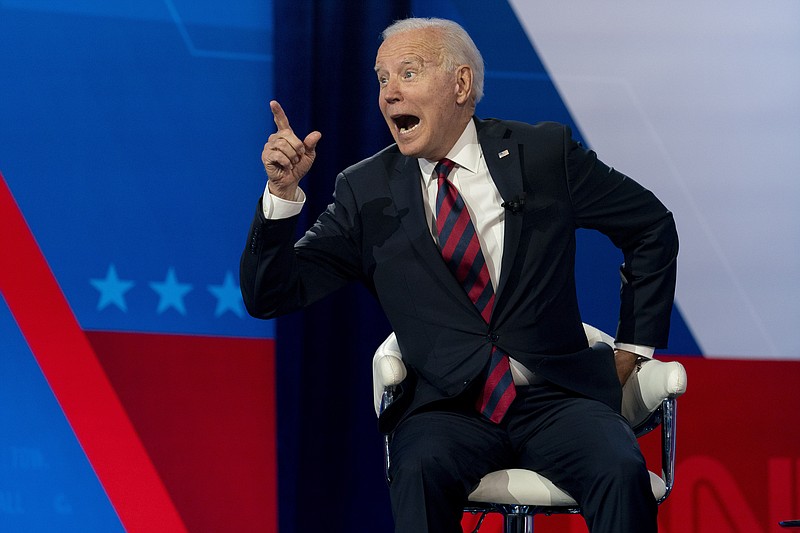 President Joe Biden interacts with members of the audience during a commercial break for a CNN town hall at Mount St. Joseph University in Cincinnati, Wednesday, July 21, 2021. (AP Photo/Andrew Harnik)