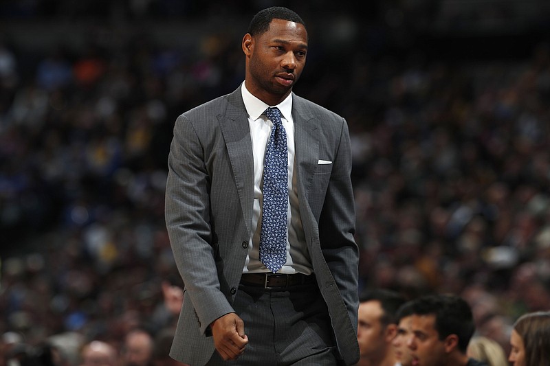 FILE - In this Nov. 24, 2019, file photo, Phoenix Suns assistant coach Willie Green looks on during the second half of an NBA basketball game in Denver. The New Orleans Pelicans have hired Green as their new head coach. Green is a first-time head coach after serving as an NBA assistant the past five years — first with Golden State and then with Phoenix, which lost to Milwaukee in the NBA Finals this week. (AP Photo/David Zalubowski, File)