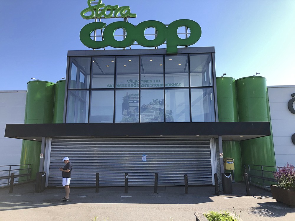 FILE - In this July 3, 2021, file photo, a closed Coop supermarket store in the suburb of Vastberga, Stockholm. The Florida company whose software was exploited in the devastating Fourth of July weekend ransomware attack, Kaseya, has received a universal key that will decrypt all of the more than 1,000 businesses and public organizations crippled in the global incident. Kaseya spokeswoman Dana Liedholm would not say Thursday, July 22, how the key was obtained or whether a ransom was paid. She said only that it came from a “trusted third party” and that Kaseya was distributing it to all victims. (Jonas Ekstromer/TT via AP, File)