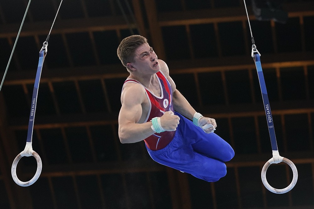 China edges Russia to take early lead in men's gymnastics