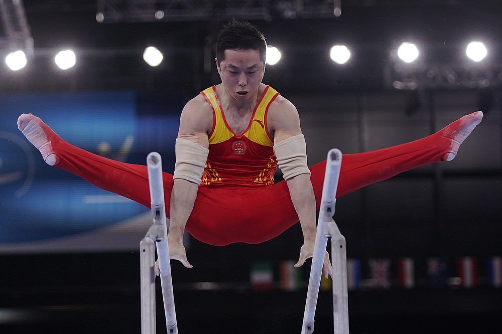 China edges Russia to take early lead in men's gymnastics