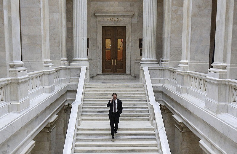 House Speaker Matthew Shepherd, R- El Dorado, walks down the steps leading to the House chamber Wednesday April 28, 2021 at the state Capitol. Legislators finished their work early Wednesday morning after coming back for a midnight session. (Arkansas Democrat-Gazette/Staton Breidenthal)