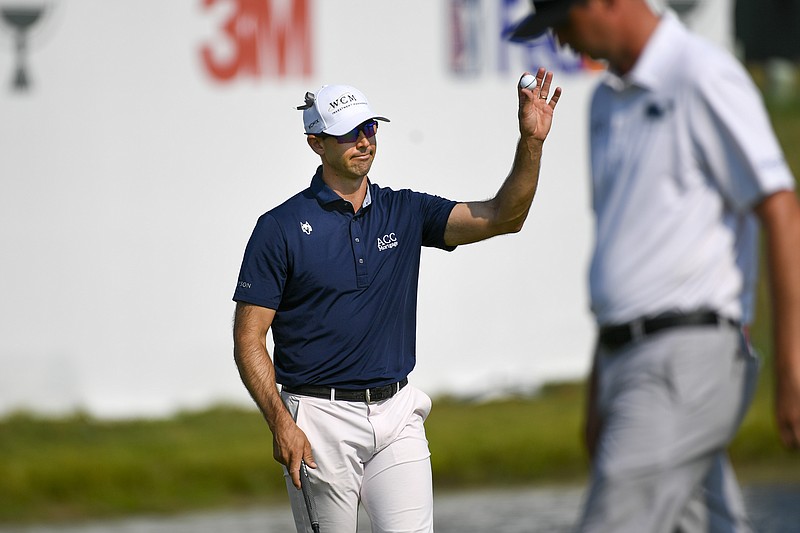 Cameron Tringale acknowledges the crowd after finishing the third round in the lead at 12 under par in the 3M Open golf tournament in Blaine, Minn., Saturday, July 24, 2021. (AP Photo/Craig Lassig)