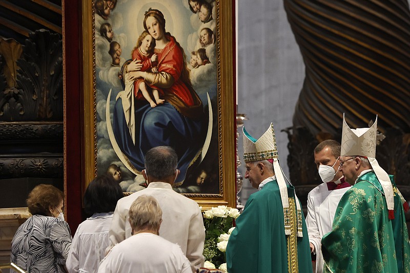 Cardinal Kevin Joseph Farrell, right, attends a Mass led by Monsignor Rino Fisichella, third from right, on the occasion of Grandparents' and the elderly World Day, in St. Peter's Basilica at the Vatican, Sunday, July 25, 2021. (AP Photo/Riccardo De Luca)