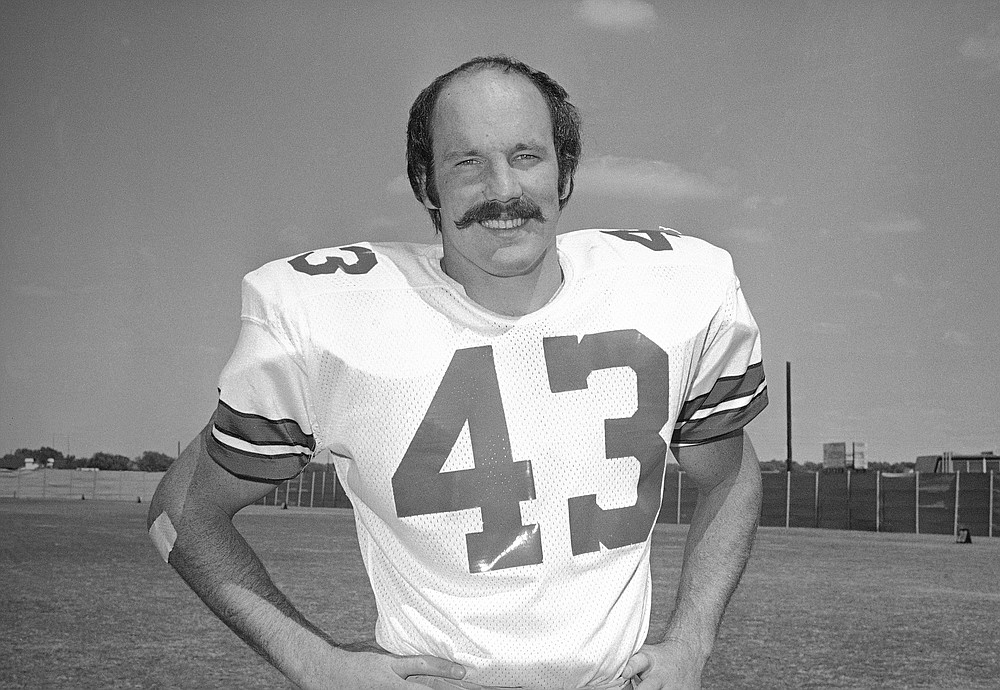 FILE - In this September 1975 file photo, Dallas Cowboys safety Cliff Harris poses for a photo, location not known. Harris and receiver Drew Pearson, who also will be inducted this year as part of the class of 2021, are the first undrafted Cowboys among their 15 players in the Hall of Fame. (AP Photo, File)