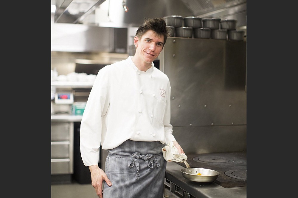 Brad Izzard, in the Capital Hotel kitchen in 2015, has been named the hotel's executive chef. (Democrat-Gazette file photo/Arshia Khan)