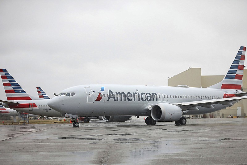 FILE - An American Airlines Boeing 737 Max taxis at Tulsa International Airport to fly to Dallas, Wednesday, Dec. 2, 2020, in Tulsa, Okla. American Airlines says itís running into fuel shortages at some smaller and mid-size airports, and in some cases the airline will add refueling stops or fly fuel into locations where the supply is tight. American said fuel supplies are being squeezed at ìseveralî airports, which it didnít name, mostly because of a shortage of tanker trucks or drivers. (Mike Simons/Tulsa World via AP, File)