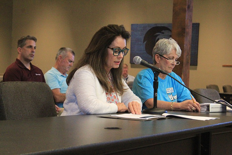 GaeVon Hoover, left, and Brenda Altman of Kitties and Kanines speak to the Fort Smith Board of Directors on Tuesday, July 27, 2021, during a study session at The Blue Lion.