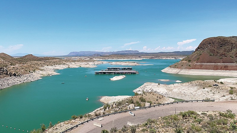 This July 10, 2021, image shows low water levels at Elephant Butte Reservoir near Truth or Consequences, New Mexico. Top climate and water experts in the state warned a panel of New Mexico lawmakers during a meeting Tuesday, July 13, 2021, that water supplies are expected to shrink even more as temperatures rise. (AP Photo/Susan Montoya Bryan)