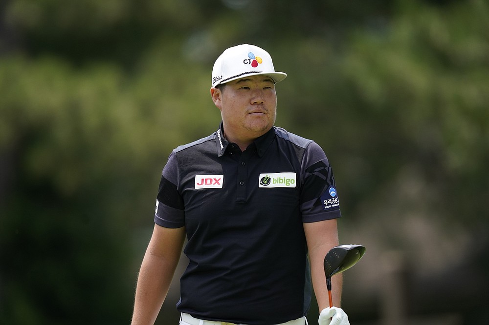 Sungja Im of South Korea watches his drive off the fourth tee during the third round of the Rocket Mortgage Classic golf tournament, Saturday, July 3, 2021, at the Detroit Golf Club in Detroit. (AP Photo/Carlos Osorio)