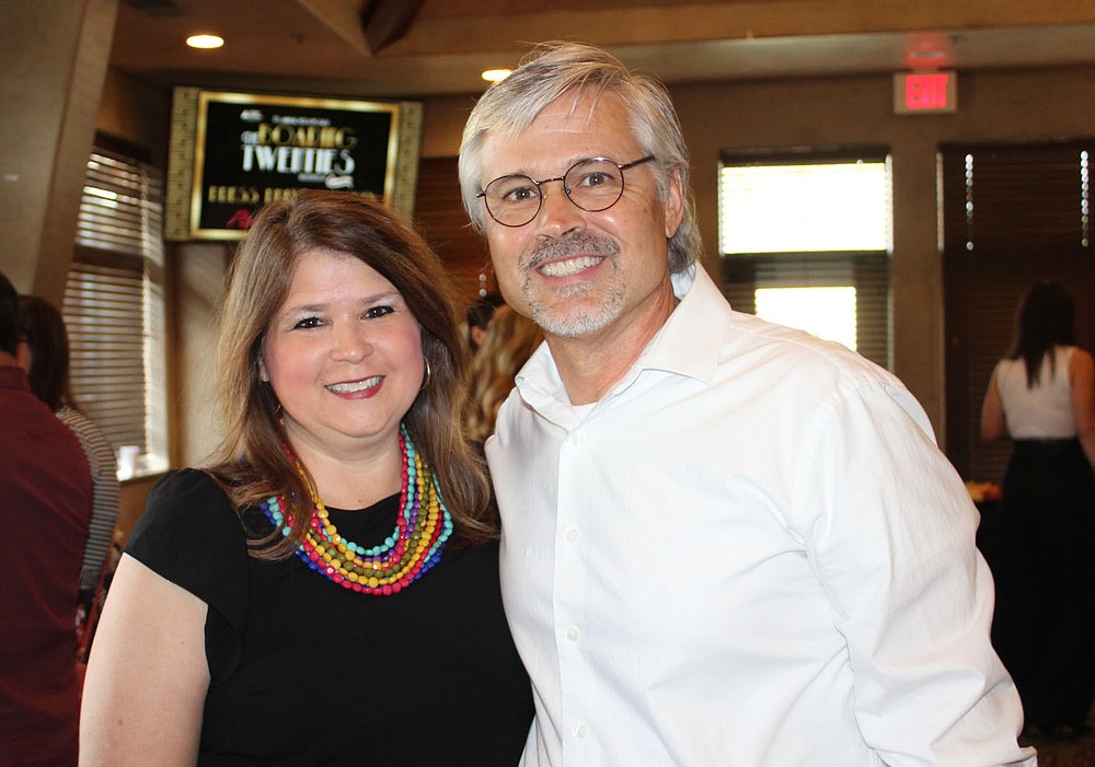 Candidate Jan and Eric Holland attend the preview party.
(NWA Democrat-Gazette/Carin Schoppmeyer)