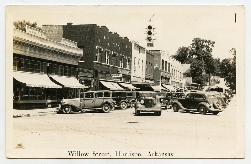 Harrison, 1940: Willow Street on the west side of the Boone County Courthouse Square was bustling with commerce and used a double-tiered parking system.