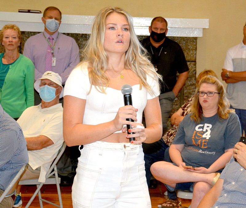 Marc Hayot/Siloam Sunday Ashley McFadin, 20, addresses the crowd about how her brother had to have delayed treatment due to hospitals being filled to capacity with coronavirus patients. According to Secretary of Health Dr. Jose Romero, 98 percent of those hospitalized with the coronavirus are unvaccinated.