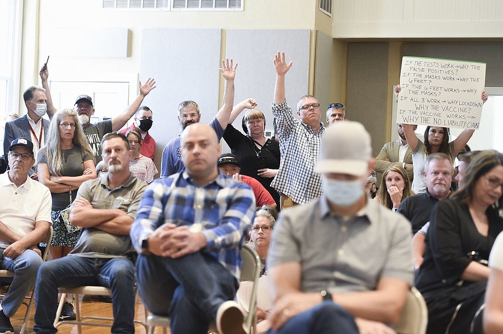 Charlie Kaijo/NWA Democrat-Gazette
The crowd gathers Friday to hear Governor Asa Hutchinson at the American Legion Community Hall in Siloam Springs. Gov. Hutchinson visited Siloam Springs for the final stop in his series of community conversation about the covid vaccine.