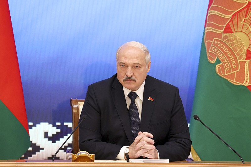 Belarus President Alexander Lukashenko speaks during a meeting with officials in Minsk, Belarus, Friday, July 23, 2021. (Sergei Shelega/BelTA Pool Photo via AP)