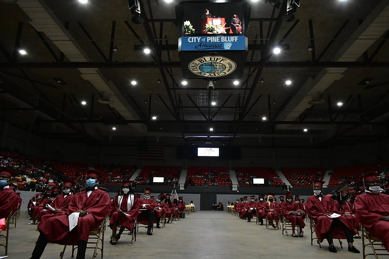 Pine Bluff High School graduates are seated during commencement on May 21 at the Pine Bluff Convention Center. (Pine Bluff Commercial/I.C. Murrell)