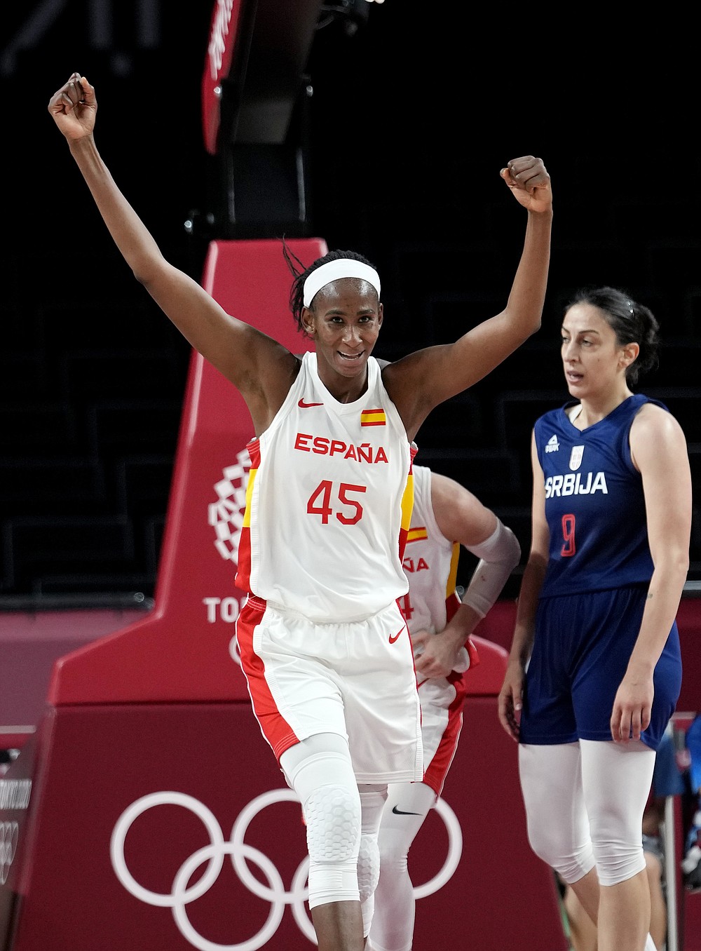 Spain's Astou Ndour (45) celebrates past Serbia's Jelena Brooks (9) during their win in a women's basketball game at the 2020 Summer Olympics, Thursday, July 29, 2021, in Saitama, Japan. (AP Photo/Eric Gay)