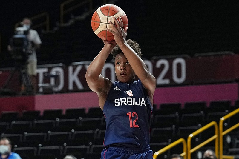 Serbia's Yvonne Anderson (12) shoots against Spain during a women's basketball game at the 2020 Summer Olympics, Thursday, July 29, 2021, in Saitama, Japan. (AP Photo/Eric Gay)