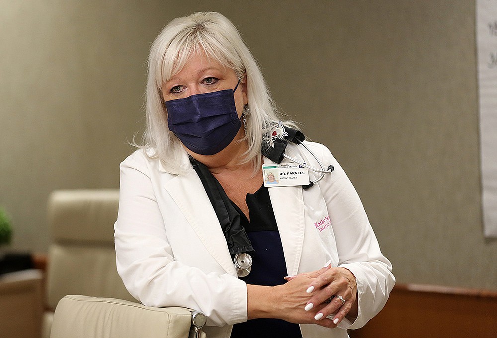 “I’ve cried every single day this week because the people are so young now,” Dr. Kathy Parnell, an internal medicine specialist at Baptist Health Medical Center in Little Rock, said recently of the strain of treating the latest wave of covid-19 patients.
(Arkansas Democrat-Gazette/Thomas Metthe)