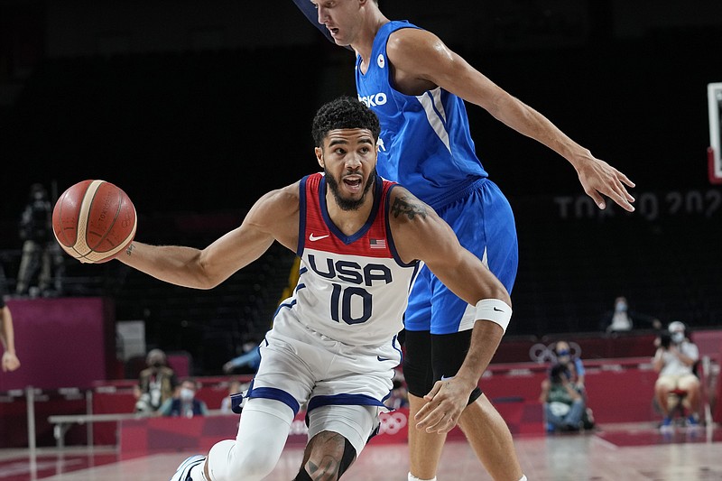 United States's Jayson Tatum (10) drives past Czech Republic's Jan Vesely (24) during a men's basketball preliminary round game at the 2020 Summer Olympics, Saturday, July 31, 2021, in Saitama, Japan. (AP Photo/Eric Gay)