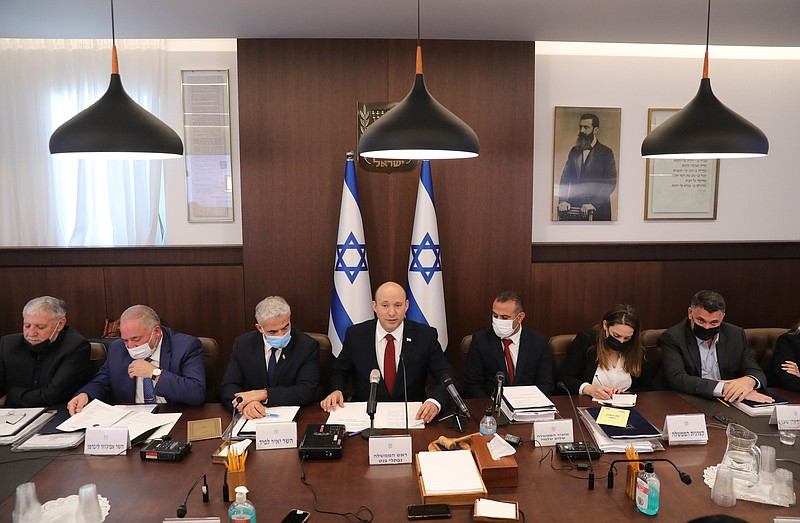 Israeli Prime Minister Naftali Bennett attends a cabinet meeting at his office in Jerusalem, Sunday, Aug. 1, 2021. (Abir Sultan/Pool Photo via AP)